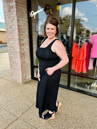 Onyx Flow Smocked Jumpsuit