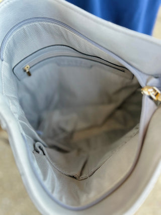 The Whipstitch Handbag w/ Guitar Strap