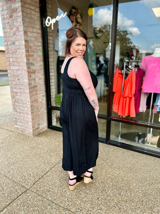 Onyx Flow Smocked Jumpsuit