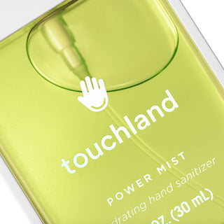 Green translucent hand sanitizer bottle with white branding and pump dispenser from Touchland