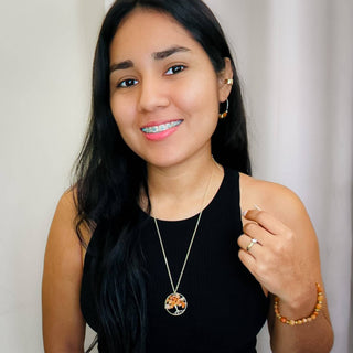 Young woman wearing the Alegria Accessories Ashton Bracelet with matching earrings and necklace set.