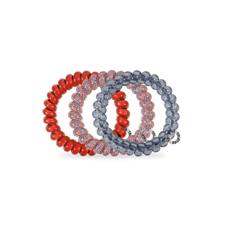 Set of four TELETIES hair ties in various colors and patterns displayed in clear packaging