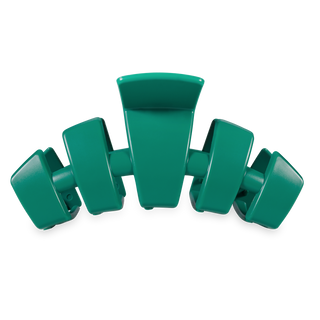 Classic large hair clip with curved teeth design in translucent material for securing hair styles.