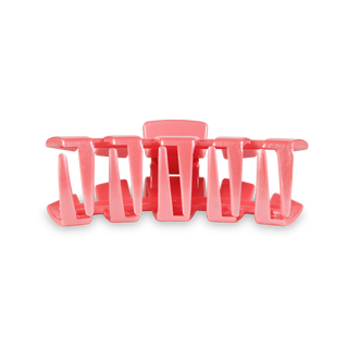 TELETIES Classic Hair Clip in coral pink color with signature spiral coil design