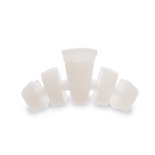 TELETIES classic hair clip in white displayed against neutral background with silhouette design element