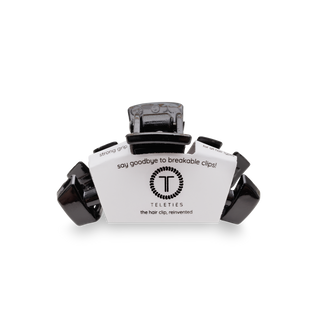 TELETIES hair clip in black with packaging showing "say goodbye to breakable clips" text