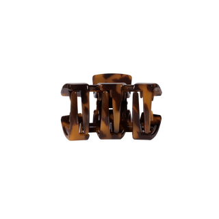 TELETIES Classic Claw Clip in tortoise shell pattern, shown from front angle on black background.