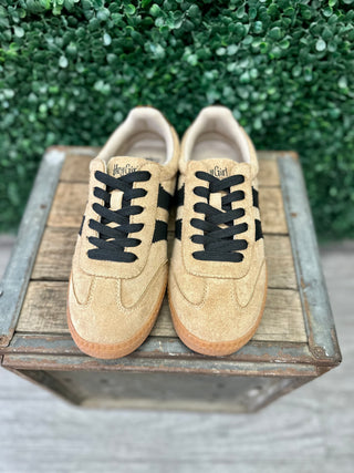 Corkys Hey Girl suede sneakers with black stripe accents and gum sole displayed on rustic wooden crate.