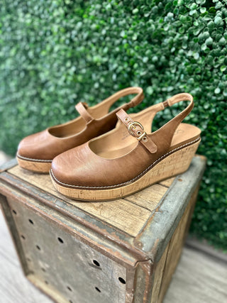 Corky's leather slingback wedge sandals with cork platform and gold buckle strap detail.