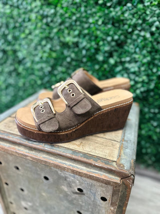 Corkys Double Dare suede wedge sandals with gold double buckle straps on cork platform.