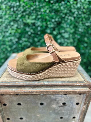 Corkys Treat Yourself suede wedge sandal with woven platform, ankle strap, and gold buckle detail.