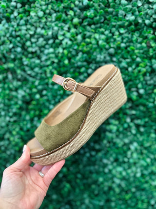 Corkys Treat Yourself suede wedge sandal with espadrille platform and ankle strap buckle detail.
