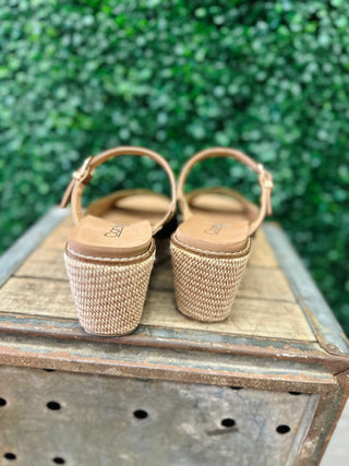 Corky's wedge sandals with woven block heels and ankle straps displayed on rustic wooden crate.