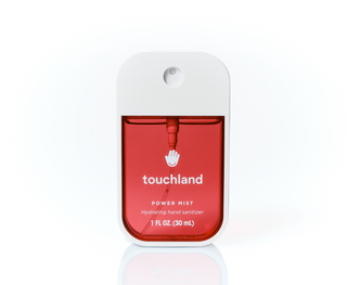 Touchland Power Mist hydrating hand sanitizer spray bottle with white cap on white background.