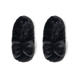 Black fuzzy slippers with bow detail and plush faux fur lining on white background