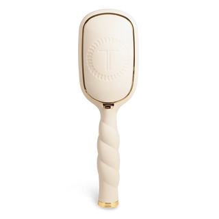 TELETIES detangler hair brush with oval head and twisted handle in neutral tone with gold accents