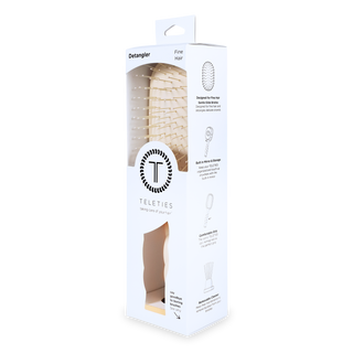 TELETIES detangler hair brush in packaging showing bristle design and product features