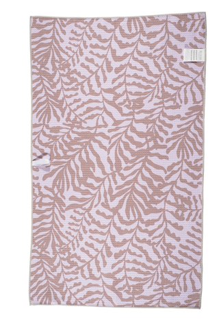 Pink and brown leaf pattern kitchen towel with botanical design on white background