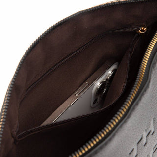 Open embossed makeup pouch showing brown interior with zippered pocket containing smartphone and small items