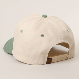 Back view of a two-tone snapback baseball cap with embroidered eyelets and logo patch.
