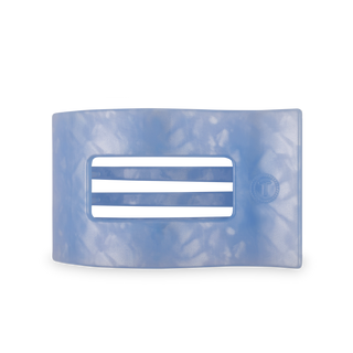 Large rectangular hair clip in translucent blue with horizontal ridge pattern for secure hold