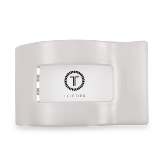 TELETIES flat rectangle hair clip in clear protective packaging with brand logo