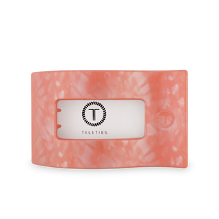 TELETIES flat rectangle hair clip in translucent coral with brand logo on clear label