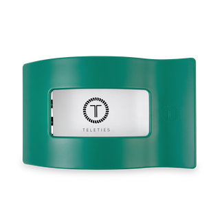 Green flat rectangle hair clip with white TELETIES logo label on front
