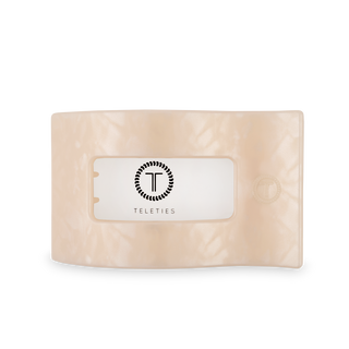 TELETIES flat rectangle hair clip in translucent beige with brand logo on white background