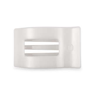 White rectangular hair clip with rounded edges and textured grip surface on transparent background