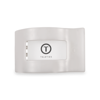 TELETIES flat rectangle hair clip in clear packaging against white background