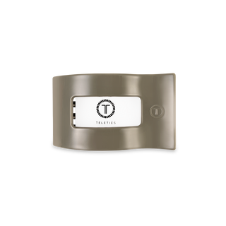 TELETIES flat rectangle hair clip in metallic sage green with brand logo displayed on white background