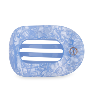TELETIES flat round hair clip in translucent blue with textured grip design