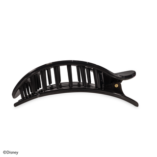 Black curved hair clip with vertical slat design and spring mechanism on white background