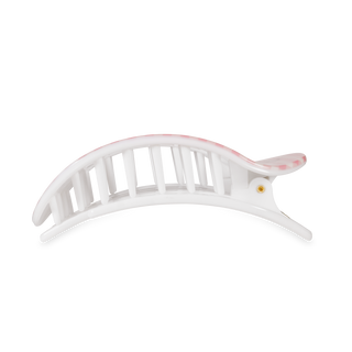 White flat round hair clip with curved design and grip teeth for securing hair
