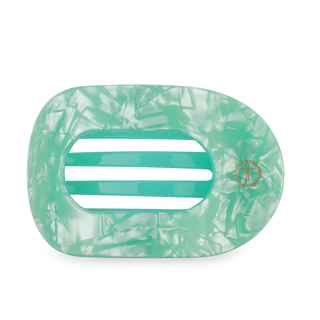 TELETIES flat round hair clip in translucent green with textured surface and grip pattern