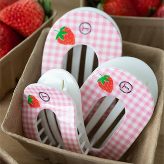 TELETIES Handpicked flat round hair clips with pink gingham pattern and strawberry design in cardboard packaging.