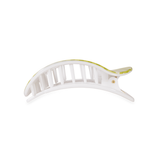 TELETIES flat round hair clip with ribbed design and black grip pads on white background