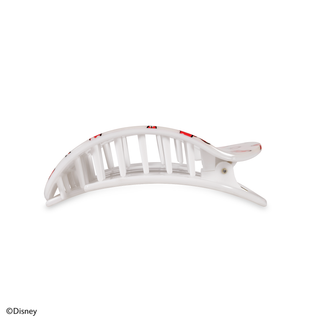 White curved hair clip with vertical slats and decorative red accents on white background.