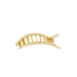 Curved plastic hair clip with ridged design and secure clasp mechanism