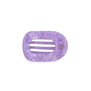 TELETIES flat round hair clip in translucent purple with textured pattern and central logo