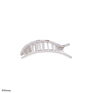 White curved hair clip with vertical slat design and decorative pattern detail