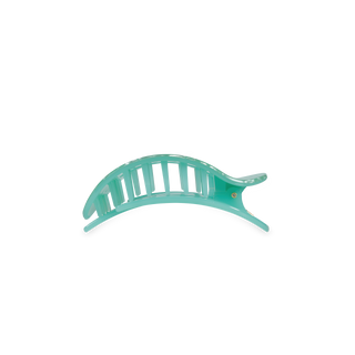 TELETIES flat round hair clip in translucent teal with ribbed texture and curved design