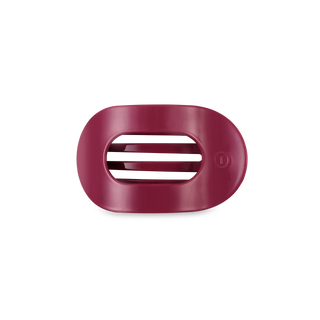 TELETIES flat round hair clip with oval opening and ridged interior grip design