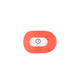 TELETIES flat round hair clip with coral colored bands and white logo center