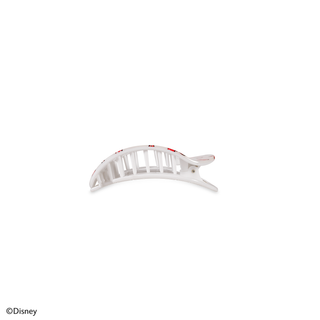 White curved hair clip with vertical slat design and small decorative details on white background.