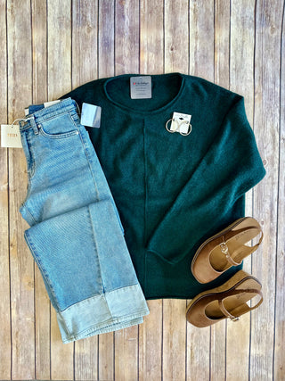 Blu Pepper sweater styled with light wash jeans, hoop earrings, and tan sandals flatlay.