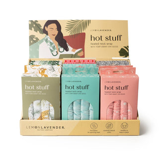 Display of Lemon Lavender heated neck wraps with spa seeds in colorful packaging boxes