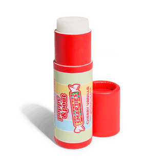 Red and white Poppy & Pout Smarties cherry vanilla lip balm with candy-inspired packaging design.