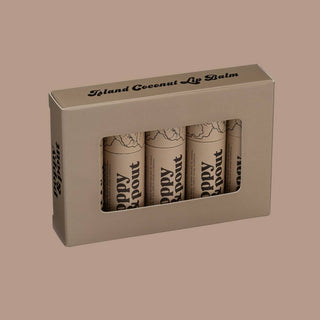 Poppy & Pout Island Coconut Lip Balm gift set with four tubes in beige packaging box